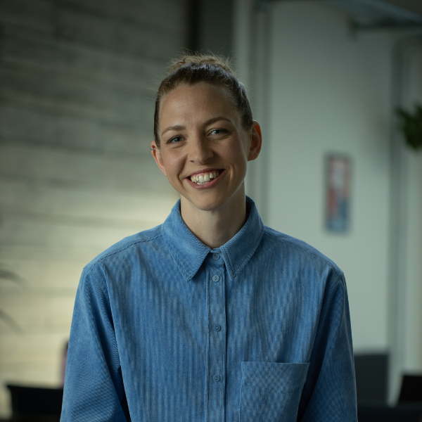 Ellie Yates smiling directly at camera